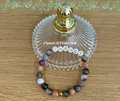 boutique de Mamie Lucie, bracelets en pierre naturelle, collection de bracelets, bracelet 7 chakras, bracelet protection, bracelet bien-être, bracelet lithothérapie, lithothérapie, pierres naturelles, énergie positive, harmonie, apaisement, sérénité, protection énergétique, équilibre émotionnel, ancrage, confiance en soi, méditation, spiritualité, développement personnel, cadeau bien-être, Saint-Louis, Bâle, Strasbourg, Colmar, Mulhouse, Dietwiller, Obersaasheim