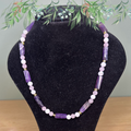 boutique de Mamie Lucie, collier en pierre naturelle, collier lithothérapie, lithothérapie, pierres naturelles, bien-être, apaisement, sérénité, harmonie, énergie positive, protection énergétique, équilibre émotionnel, confiance en soi, développement personnel, méditation, spiritualité, ancrage, clarté mentale, cadeau bien-être, Saint-Louis, Bâle, Strasbourg, Colmar, Mulhouse, Dietwiller, Obersaasheim